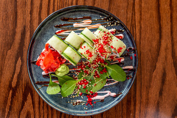 European rolls with rice and nori. composition of rolls: salmon, tuna, avocado, shrimp. Concept menu of summer cafe