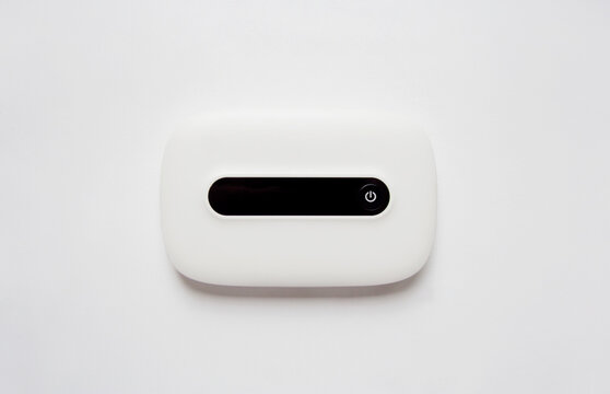 Mobile WiFi router mockup isolated on white background from a high angle view