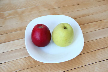 Apples on a wooden background
