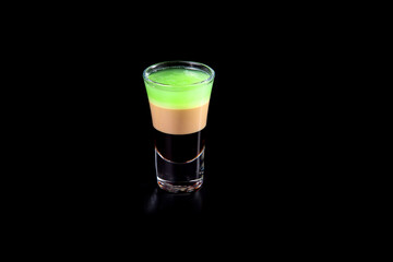 aperitif is an alcoholic cocktail made from various ingredients. Cocktail - one glass on a black...
