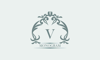 Graceful monogram in gray tones with the inscription and the letter V. Exquisite sign, logo of a restaurant, boutique, hotel, business