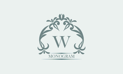 Graceful monogram in gray tones with the inscription and the letter W. Exquisite sign, logo of a restaurant, boutique, hotel, business