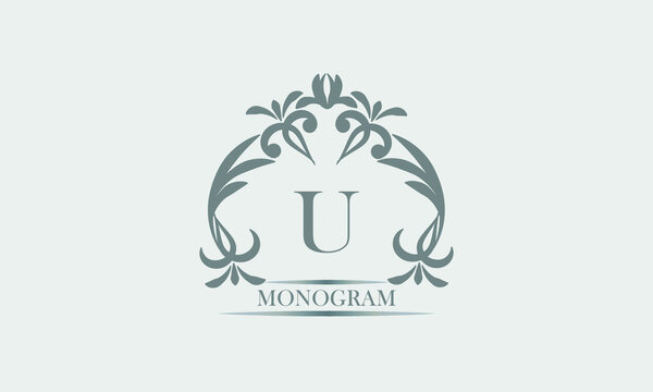 Graceful monogram in gray tones with the inscription and the letter U. Exquisite sign, logo of a restaurant, boutique, hotel, business