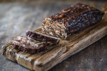Chocolate sausage. Dessert of cookies, chocolate, coffee and condensed milk
