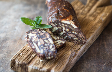 Chocolate sausage. Dessert of cookies, chocolate, coffee and condensed milk