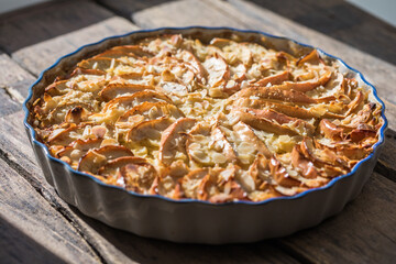 Apple pie. Piece of fresh baked homemade layered tart with fresh apples.