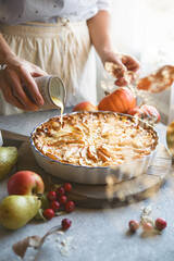 Apple pie. Piece of fresh baked homemade layered tart with fresh apples.