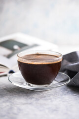 Coffee cup on the concrete  background, hot and fresh morning