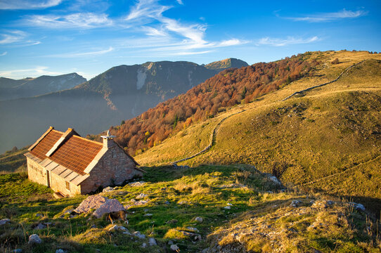 autumn landscape with farm hous on the Lessinia Plateau
