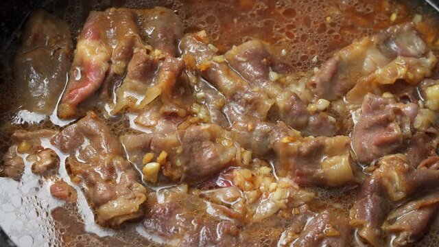 Chinese style home-cooked beef with golden needles and beef mushrooms