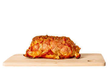 Fatty stuffed baked piece of meat on wooden cutting board isolated on white background