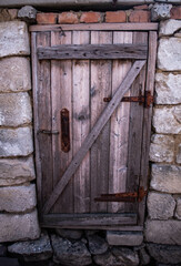 old wooden door with shutters