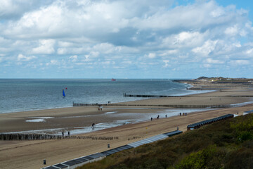 View on white sandy  beach, dunes and water of North sea between Vlissingen en Domburg, Zeeland, Netherlands