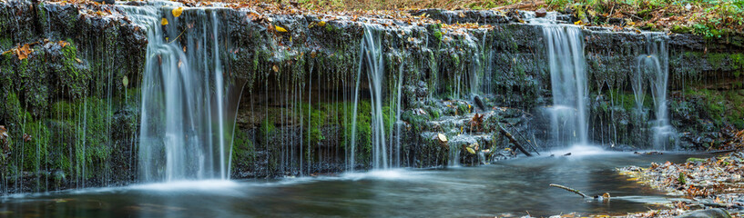 Large-format panorama with a small waterfall