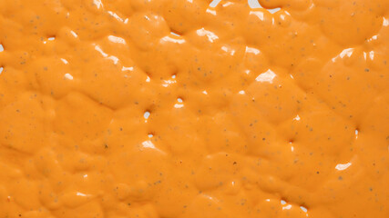Whipped delicious sauce texture. Hamburger sauce background.