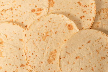 Grilled pitta bread isolated on white background.
