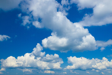 Naklejka na ściany i meble Light blue sky with clouds, can be used as background
