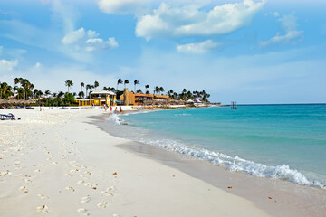 Fototapeta na wymiar Palm beach at Aruba island in the Caribbean Sea