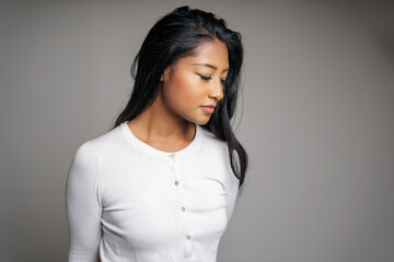 Fototapeta premium nice gray background portrait of beautiful young black woman