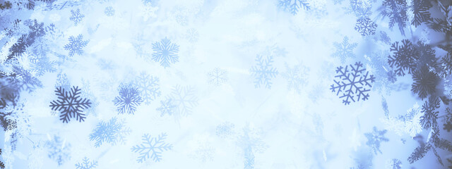 3D render of snowflakes falling through the sky in a blizzard white background
