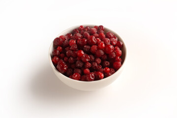 Frozen cranberry in white background. Close up food photo