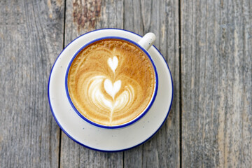 Hot coffee with latte art.
