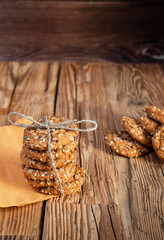 Fototapeta premium American cookie with seed pieces laid out in a stack on a wooden table.