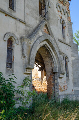 Entrance to the old brick castle. Destruction of Christian shrines