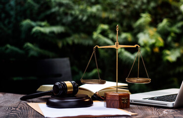 Business and lawyers discussing contract papers with brass scale on desk in office. Law, legal...