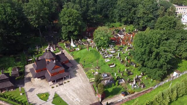 View of the Church of the Annunciation of the Blessed Virgin Mary. Christian church near old cemetery in Kolomyia. Drone Video. Ukraine. Europe