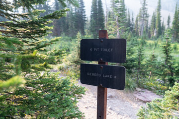 Sign for the pit toilet along the Iceberg Lake trail in Glacier National Park
