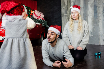 Happy Family Celebrating Christmas at Home