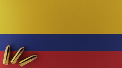 Three 9mm bullets in the bottom left corner on top of the national flag of Colombia
