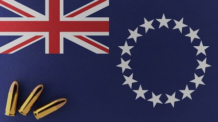 Three 9mm bullets in the bottom left corner on top of the national flag of Cook Islands
