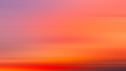 Colorful cloudy sky at sunset. Gradient color. Sky texture, abstract nature background motiom blur.