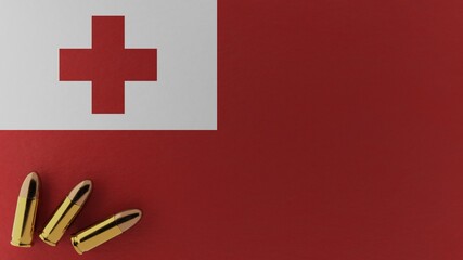 Three 9mm bullets in the bottom left corner on top of the national flag of Tonga