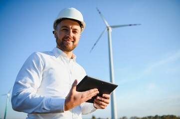 Power engineer are working with wind turbines.