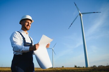 Wind turbines generating electricity. energy conservation concept.