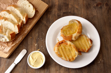 French bread sliced ​​and prepared with butter