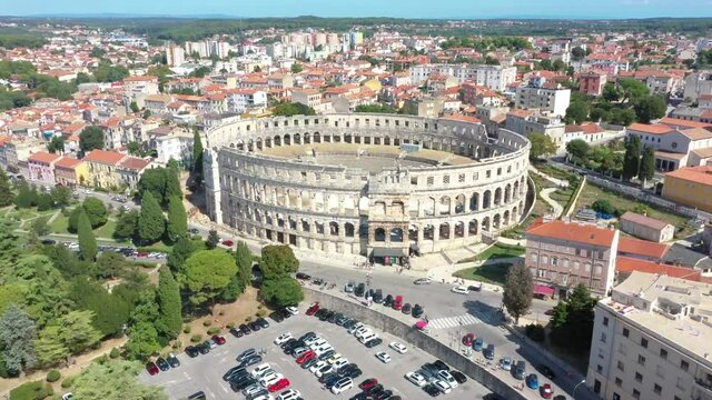 Drone video of the amphitheater of the Croatian coastal city of Pula taken during the day