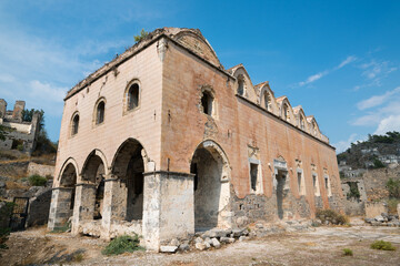 Kayaköy Abandoned ghost town, stone houses and ruins. The site of the 18th-century Ancient Greek city of Karmilissos. Ancient church. Fethiye - TURKEY