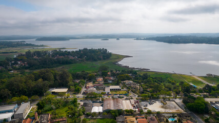 Fototapeta na wymiar Aerial view of the Interlagos district. Beautiful houses and a view of the Guarapiranga dam