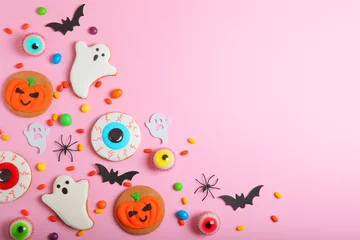 Fotobehang Halloween sweets on colored background close up top view with place for text © White bear studio 