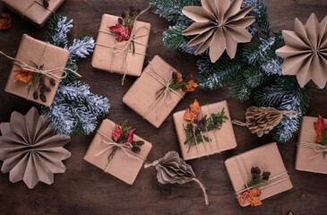 Fototapeta na wymiar Christmas gift boxes in craft paper