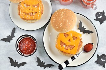 Funny monster chicken burger with with toast cheese. Halloween food.