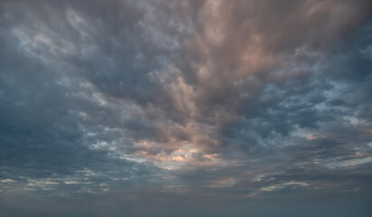 Naklejka na ściany i meble Dramatic sky in late evening
