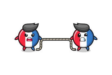 cute france flag character is playing tug of war game