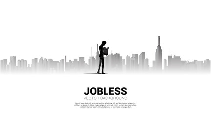 silhouette of losing job man walking with big city background. Concept for depression of unemployment people.