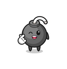 bomb character doing Korean finger heart