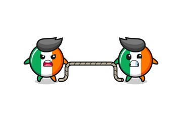 cute ireland flag character is playing tug of war game